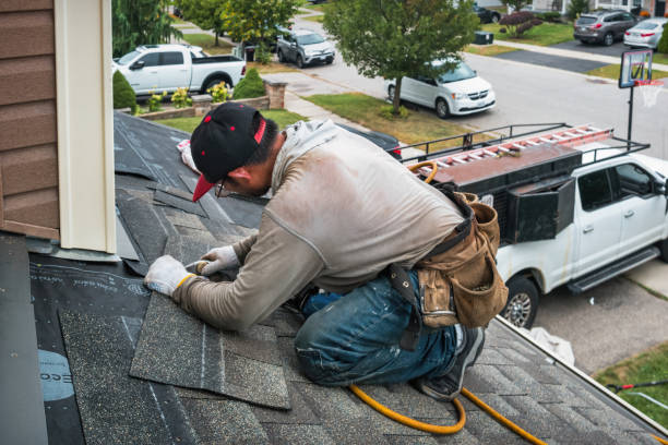 Professional Metal Roofing technician working in Oakland, RI